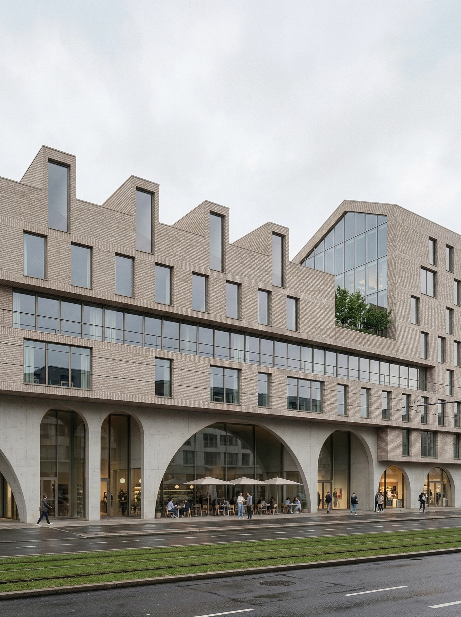 Long stepped-gable brick facade of the Kristall complex over a concrete arcade, with a cafe terrace and planted roof garden.